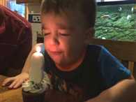 Two Year Old Birthday Boy Just Can't Blow Out Candle on Cake